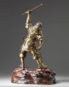 A Japanese bronze figure of a Samurai