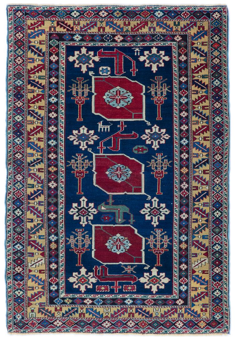AN UNUSUAL CAUCASIAN KARAKASLI RUG, 19TH CENTURY