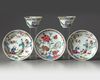 Two pairs of Chinese famille rose bowl 'ladies' cups and a 'cats' saucer