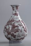 A Chinese blue and white and underglaze copper red 'dragon' pear-shaped vase, yuhuchunping