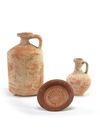 A Chinese pottery jug, a juglet and a stem dish
