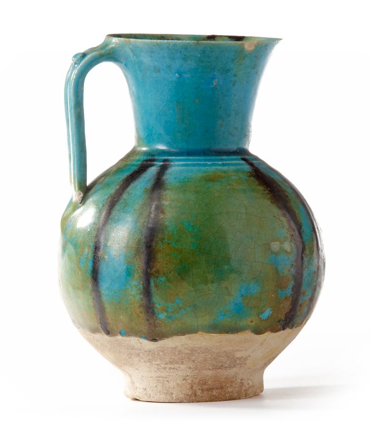 A RAQQA WARE VESSEL, SYRIA, FIRST HALF 13TH CENTURY