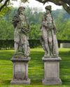 A PAIR OF SCULPTED LIMESTONE MODELS OF FISHERMEN, 19TH CENTURY