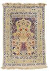 A FINE SILK AND METAL TURKISH HEREKE SILK RUG