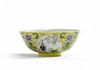 A Chinese yellow-ground sgraffiato famille rose medallion bowl
