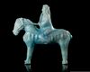 A RARE KASHAN TURQUOISE-GLAZED FIGURE OF A MONGOL, PERSIA, 13TH CENTURY