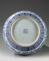 A Chinese blue and white 'Eight Buddhist Emblems' pear-shaped vase, hu