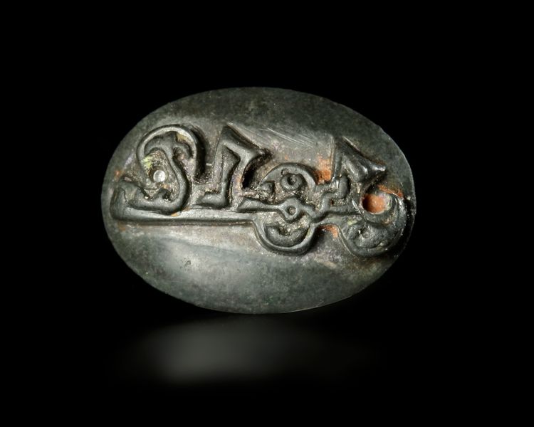 AN EARLY ISLAMIC BRONZE SEAL, NEAR EAST, 7TH-10TH CENTURY