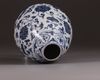 A small blue and white vase