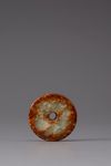 A celadon and russet jade bi