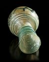 A ROMAN LIGHT GREEN GLASS VASE, 1ST CENTURY AD