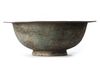 A MONUMENTAL KHORASAN BRONZE SERVING BOWL, SIGNED BY 'ABU BAKR MUHAMMAD IBN HASAN AL-HERATI,  PERSIA, 13TH CENTURY