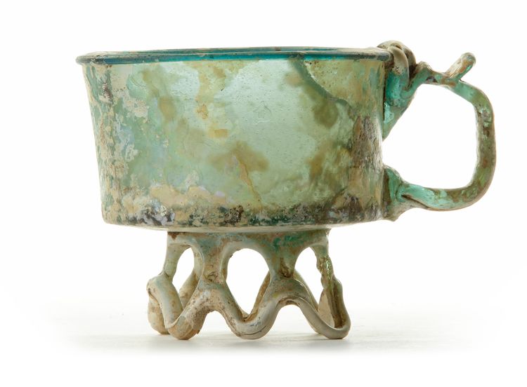 AN APPLIED GLASS FOOTED CUP, PERSIA, 9TH CENTURY