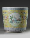 A Chinese yellow-ground famille rose 'boys' jardiniere