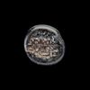 AN EARLY ISLAMIC GLASS WEIGHT OF QUARTER DIRHAM