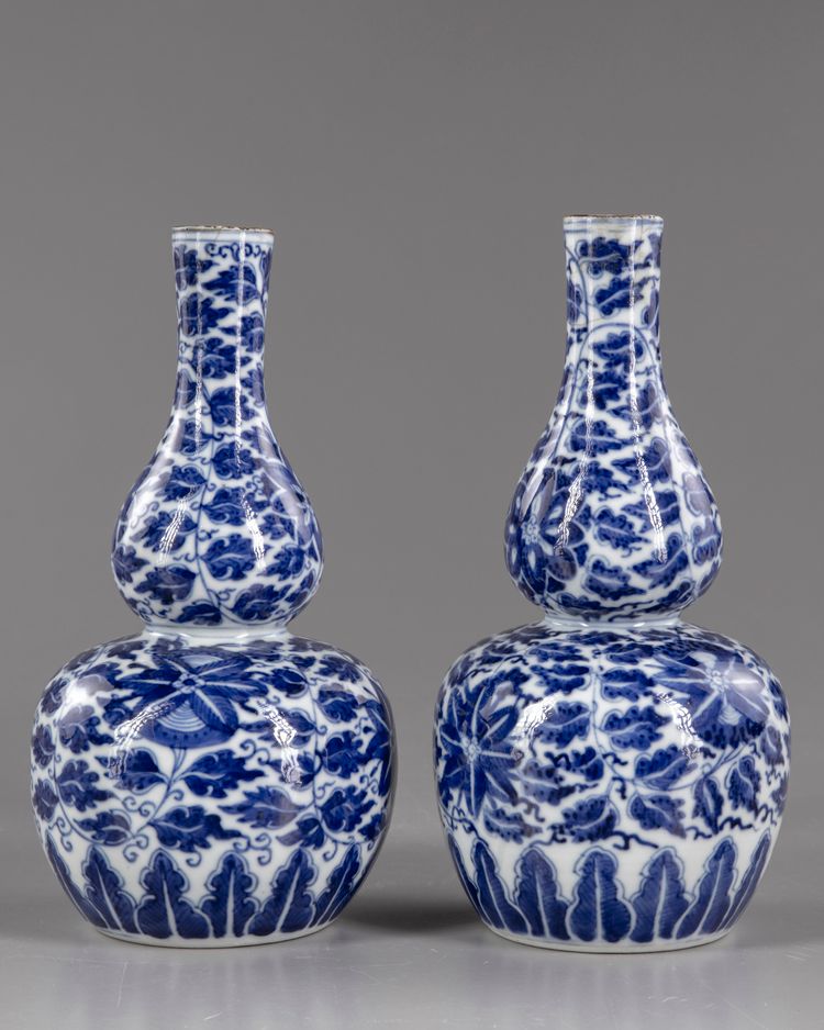 TWO CHINESE BLUE AND WHITE DOUBLE-GOURD VASES
