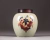 A Chinese celadon-ground 'nine peaches' ovoid jar