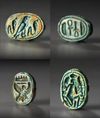 A GROUP OF EGYPTIAN GLAZED COMPOSITION SCARAB SEALS WITH HIEROGLYPHIC MOTIF, MIDDLE TO LATE KINGDOM, CIRCA 2133-525 B.C.