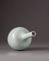 A celadon glazed bottle-vase