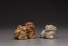 Two jade Buddhist lion carvings