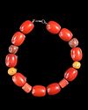 A CHINESE STYLE RED BEADED NECKLACE