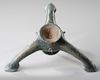A BYZANTINE THREE -SPOUTED BRONZE OIL LAMP, CIRCA 4TH-5TH CENTURY A.D.