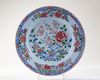 A CHINESE FAMILLE ROSE CHARGER
