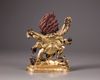 A Sino-Tibetan gilt bronze figure of Sadbhuja Mahakala