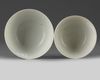 A set of two Chinese sepia-decorated 'landscape' bowls