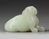 A PALE CELADON JADE CARVING OF A LION, QING DYNASTY (1644–1911),18TH CENTURY