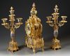 A FRENCH CHAMPLEVÉ ENAMEL CLOCK SET, 19TH CENTURY