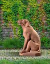 A VENETIAN TERRACOTTA MODEL OF A SEATED HOUND, 19TH CENTURY