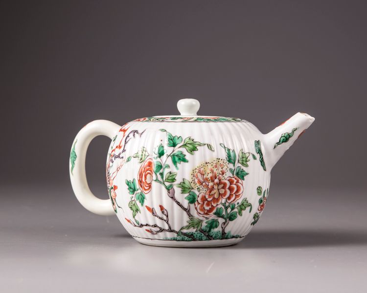 A Chinese famille verte moulded teapot and cover