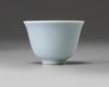 A small Chinese pale-blue glazed cup