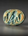A GROUP OF EGYPTIAN GLAZED COMPOSITION SCARAB SEALS WITH HIEROGLYPHIC MOTIF, MIDDLE TO LATE KINGDOM, CIRCA 2133-525 B.C.