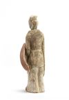 A Chinese painted pottery model of a standing warrior