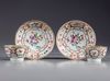 TWO PAIRS OF CHINESE FAMILLE ROSE AND GILT CUPS AND SAUCERS, QIANLONG PERIOD (1736-1795)