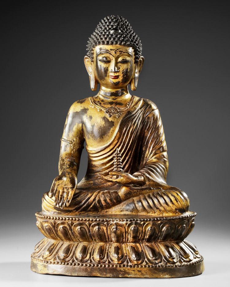 A  LARGE SINO-TIBETAN GILT BRONZE SEATED BUDDHA, 19TH CENTURY