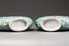 A matched pair of Chinese turquoise-ground famille rose moonflasks