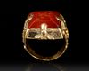 A SELJUK GOLD RING WITH ENGRAVED RED AGATE SEAL, ANATOLIA OR CENTRAL ASIA, 12TH-13TH CENTURY