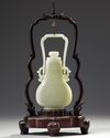 A CHINESE PALE JADE HANGING VASE WITH COVER AND HARDWOOD STAND