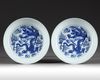 A PAIR OF CHINESE BLUE AND WHITE 'DRAGON' DISHES, TONGHZI SIX CHARACTER MARK