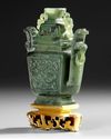 A CHINESE JADE  WITH COVER AND STAND