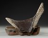 A FINE LEATHER COVERED WOODED SADDLE, CENTRAL ASIA, 19TH CENTURY
