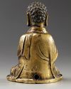 A CHINESE  GILT BRONZE FIGURE OF A BUDDHA, LATE MING DYNASTY, 17TH CENTURY