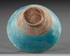 A KASHAN TURQUOISE-GLAZED POTTERY BOWL, PERSIA 12TH-13TH CENTURY