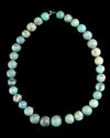 A TURQUOISE BEADED NECKLACE