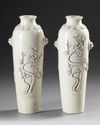 A PAIR OF CHINESE DEHUA BLANC DE CHINE ROULEAU VASES,QING DYNASTY (1644–1911)