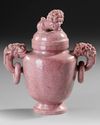 A CARVED PINK STONE LION VASE,  CHINA, 20TH CENTURY