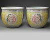 A pair of Chinese famille rose 'dragon and phoenix' jardinieres